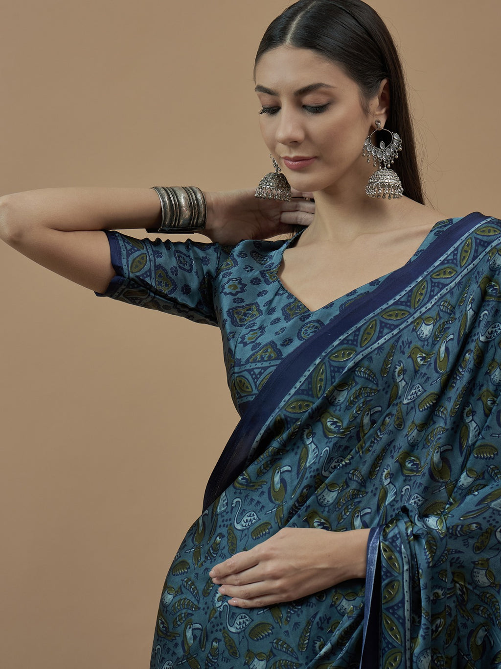 Teal Blue Animal Printed Crepe sik saree